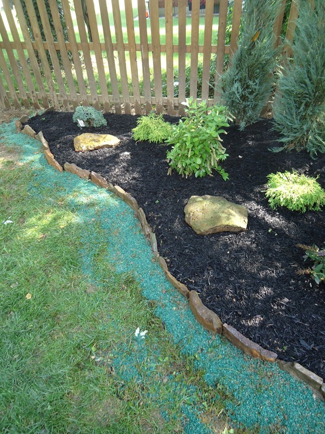 stone border edging for a garden patching with 1 step complete