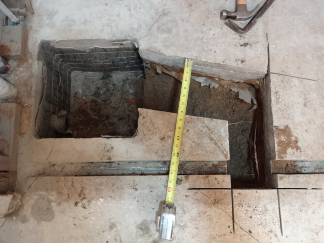How do you install plumbing in a concrete slab?