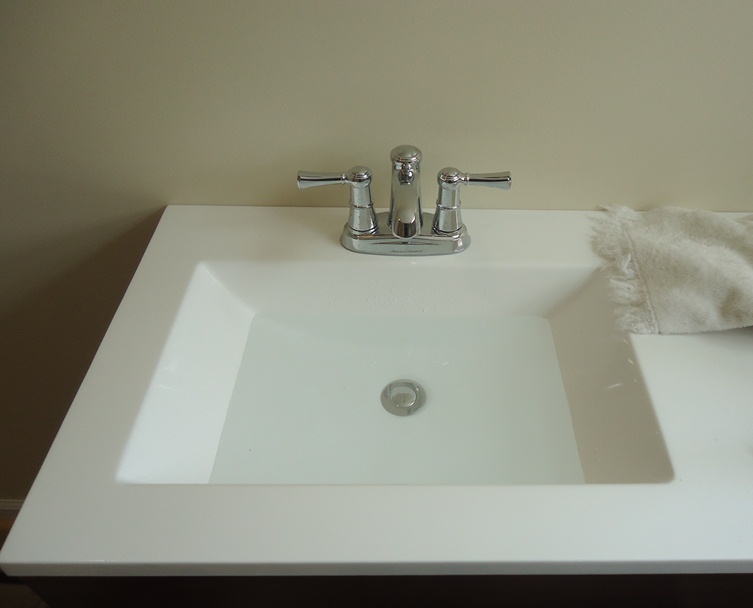 Installing A Bathroom Faucet American Standard S Outreach Chrome Faucet On A White Vanity Top