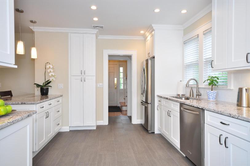 Things To Consider When Ing Kitchen Cabinets Building Moxie Light And White Contemporary Kitchen Quality Cabinets Symmetry