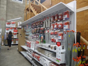 Baltimore's Newest Ace Hardware :: woman walks the aisles Canton Ace Hardware